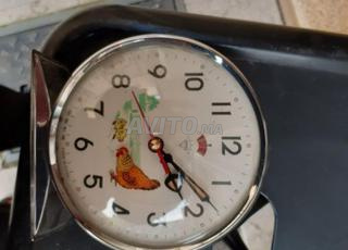 ساعة الاستيقاظ القديمة الدجاجة بكتاكيتها