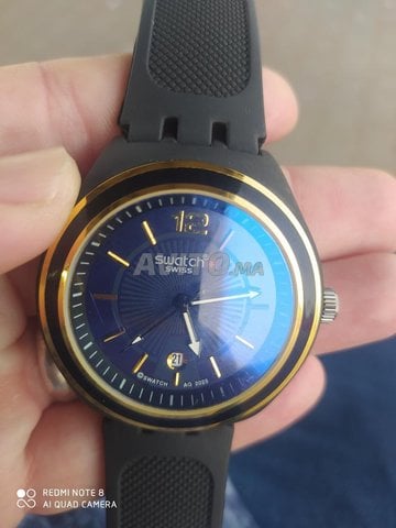 Swatch swiss AG 2025 jamais porté comme neuf 
