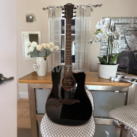 Guitare électro acoustique LAG Tramontane 100 DCE