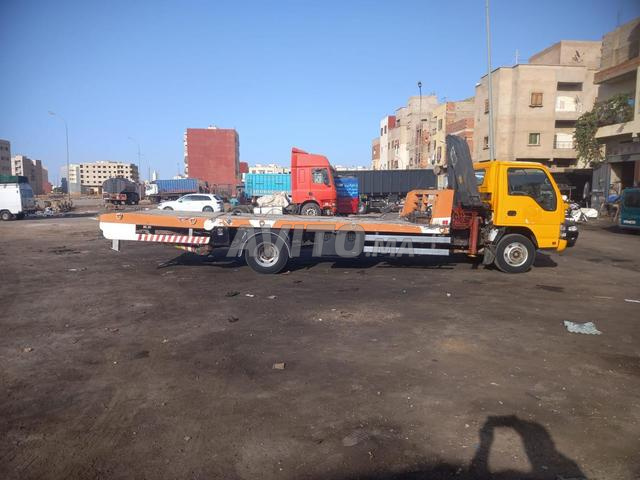 camion dépannage plateau avec grue en TB état 
