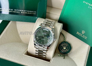Rolex day date fond vert automatique
