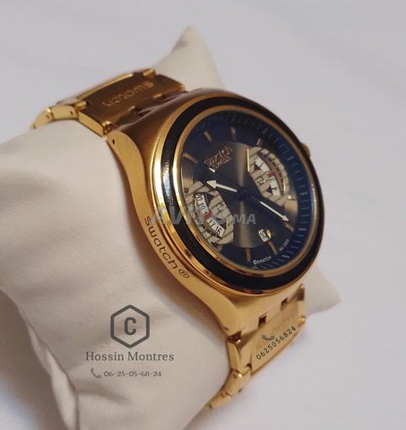 Swatch 🇨🇭 2025 - Homme  / Doré