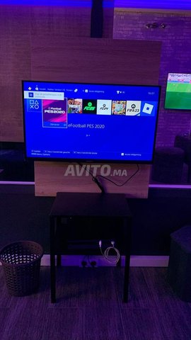 Ps4 slim 500go 2 manette Tv skyworth 32 full hd 