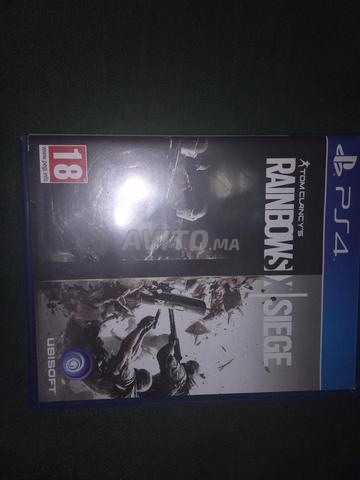 PS4 slim avec deux mannete et rainbow six cd - 2