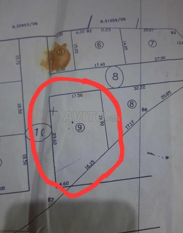 بقعة محفضة قرب حمام تجزئة الاخلاص طريق ايت باها