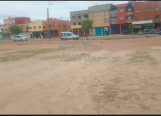    بقعة أرضية مسجلة و محفظة صالحة للبناء  