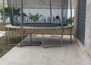 trampoline très bon état 