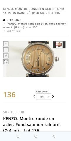 KENZO. Montre ronde en acier. Fond saumon rainuré