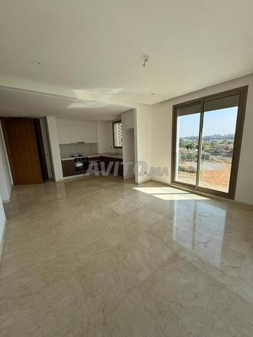 Un joli appartement en location à souissi - image 5