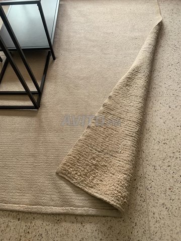 Tapis en laine de couleur blanche