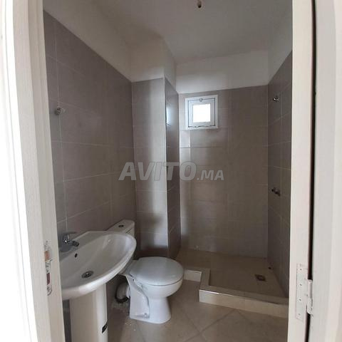 Appart neuf ascenseur syndic 5 min malabata  - 2