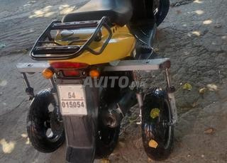 Kymco modél 2011 لدوي إحتياجات خاصة