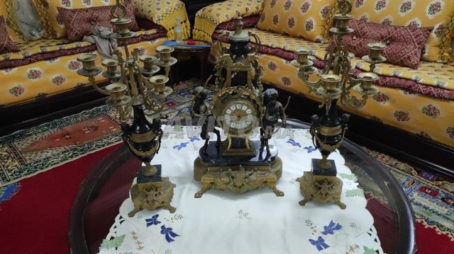 horloge et chandeliers anciens