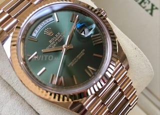 Rolex day date fond vert automatique