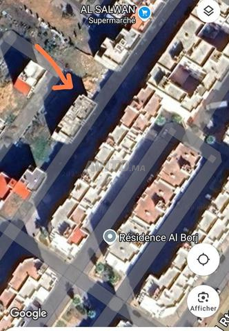 terrain a vendre titré et loti - 2