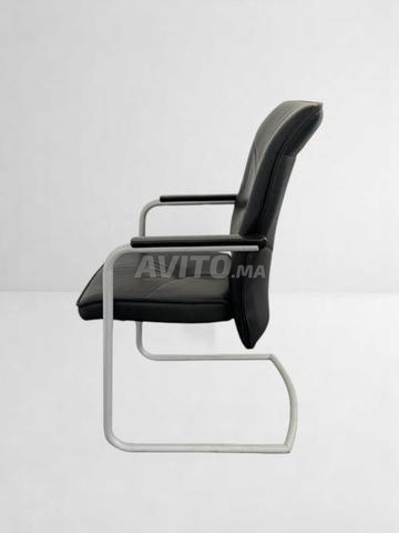 Fauteuil accueil cuir noir Klober luge chromé