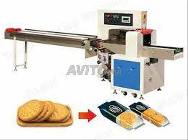 Machine d'emballage flow pack
