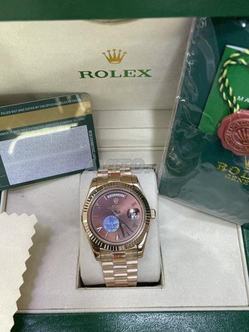 Rolex day date rose gold automatique avec la boite