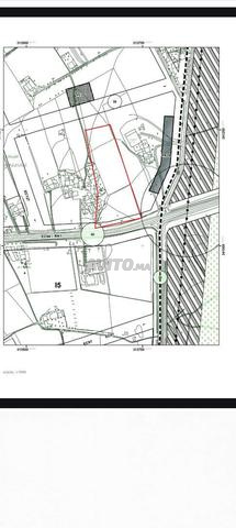 أرض للبيع صناعية عين حرودة 15 على شارع 