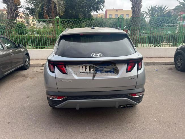 tucson hybrid e