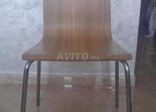 Chaises en bois et inox