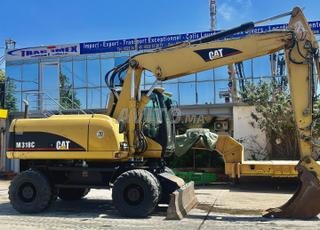 CAT M318C 2006 DOUANE 2025 
