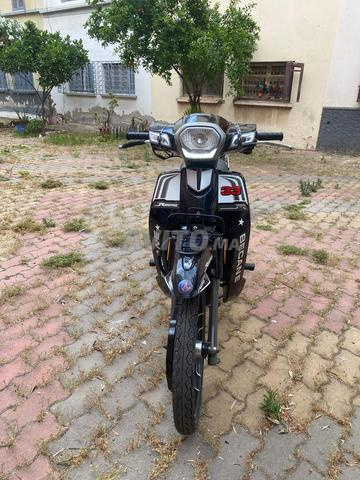 bécane 33/motor ba9i jdid avec pièce de la maison 