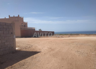 terrain titré de 160m² au bord de la mer
