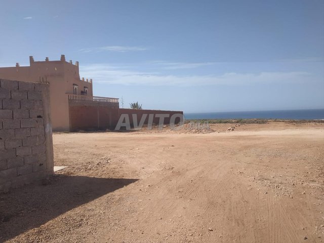 terrain titré de 160m² au bord de la mer