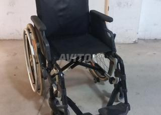 fauteuil roulant pliable كرسي متحرك 