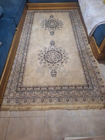 Tapis oriental en très bon état.