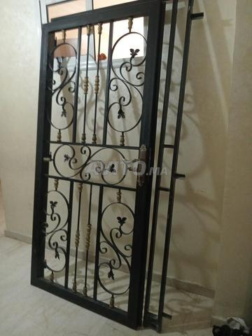 2 portes en fer forgé et bois