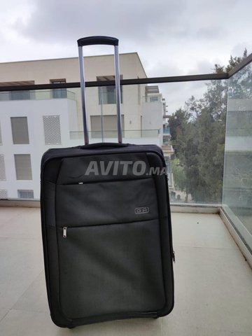 Valise moyenne GA avec roulettes et serrure TSA