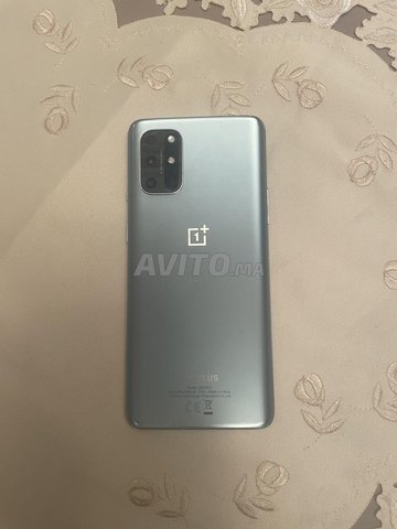 telphon one plus 8 128 gg baki ne9i fih tmn mzian 