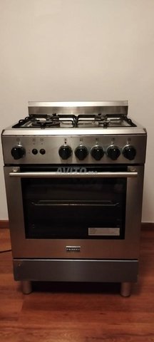 Cuisinière Franke inox 5 feux et four quasi neuve
