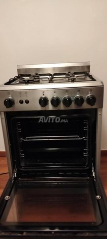 Cuisinière Franke inox 5 feux et four quasi neuve