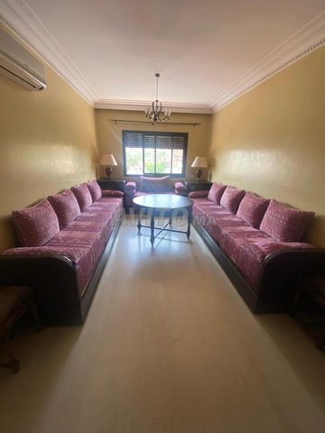 Salon marocain avec meuble tv