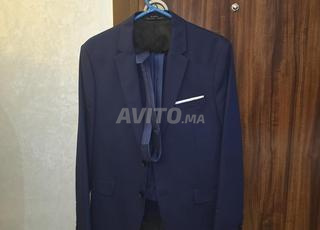 2 costumes en exellent état taille 38