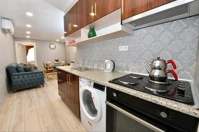 app équipé abwab guéliz lila 300