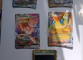 4 Pokémon VMAX plus Trainer ultra rare
