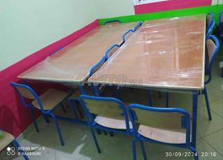 Table de décharge	طاولة تفريغ