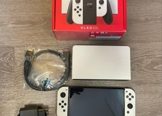 Nintendo Switch OLED Presque Neuf Avec Tout