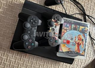 ps3 super slim avec 3 manete original 500gb 8 jeux
