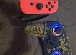 NINTENDO SWITCH BA9A JDIDA 5 JEUX INCLUS CADEAU