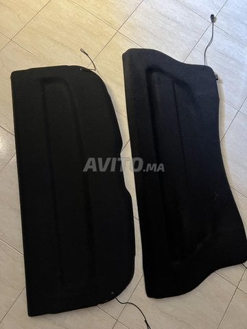 2 caches bagages l’un de clio 4 et le 2eme de 208