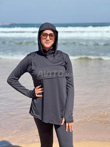 Burkini 3 pièces avec bonnet assorti.