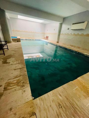 Appartement bien placé avec piscine couverte 