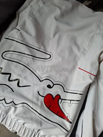 Ensemble sport noir/blanc style Lacoste tendance