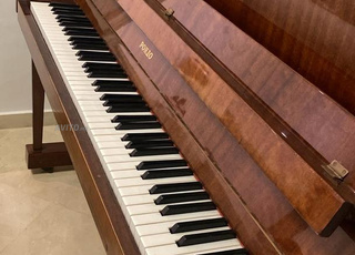 Piano en bonne état 