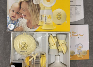 Tire lait Madela double - Presque neuf